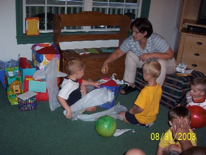 PJ is opening his gifts